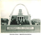 Homecoming victory arch on Pentacrest in front of Old Capitol, The University of Iowa, 1960s?