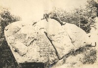 Man & Child on Large Rock 