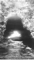 Mouth of cave at Devil's Den, Iowa, late 1890s or early 1900s