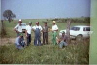Group of Men in Corn Field