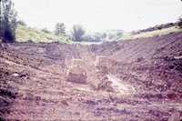 Digging a drainage channel.