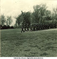 Soldiers marching on a field, The University of Iowa, 1950s