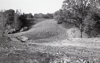 1970s Earthmoving machinery in field