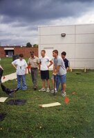 1999 Four students learning tree planting