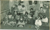 School children weaving in class, The University of Iowa elementary school, 1920s