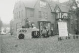 Theta Xi Homecoming lawn display, ""Iowa squeezes past Jayhawks,"" 1962