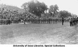 Governor N.E. Kendall saluting cadets in review on Iowa Field, The University of Iowa, May 10, 1924