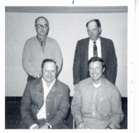 Photographs of various district members, 1975