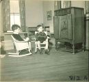 Small boys listening to a radio, The University of Iowa, January 12, 1938