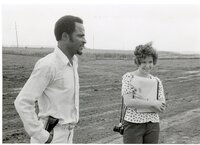1979  William Baugh talks to woman in a field