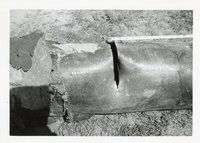 Photograph Of A Damaged Pipe 
