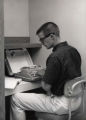Student using the Typing Room in the newly opened 1st Addition, 1961