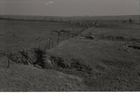 Fenced area by ravine
