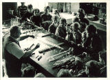 Fourth grade class watching glass-blowing demonstration, The University of Iowa, May 11, 1935