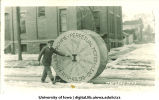 Athletic "perpetual motion" wheel in Mecca Day parade, The University of Iowa, 1923
