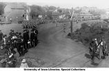 Band and cadets marching through town, The University of Iowa, 1912