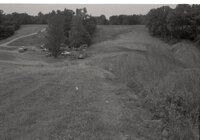 1970's Grassy field with machinery