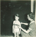 Measuring a child's torso, The University of Iowa, 1938