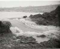 Rushing Flood Water Erodes Land