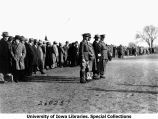 Crowd and VIPs waiting in field, The University of Iowa, 1929