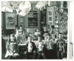 School children with their artwork, The University of Iowa elementary school, 1950s
