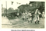 Marching band in parade, The University of Iowa, 1910s