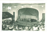 Men assembled on a stage for speeches, The University of Iowa, 1930s