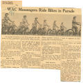 WAC messengers ride bikes in parade