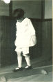 Girl walking on balance beam, The University of Iowa, ca. 1920