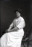 Woman, hands clasped