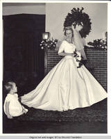Unknown child and Frindy Gronen looking at each other in living room
