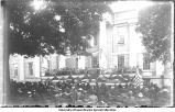 Graduation ceremony in front of Old Capitol, The University of Iowa, 1899