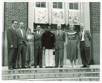 Library personnel in front of Main Library north entrance, The University of Iowa, 1955