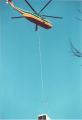 Helicopter flying to Main Library with HVAC system , the University of Iowa, 1994