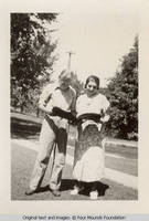 Sandy and Arlene reading outside