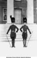 ROTC band conductors standing next to Old Capitol, The University of Iowa, 1930