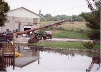 1993 Flood water being piped into the Iowa River