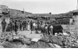Crew of men near lower quarry beds, east of Farley, Iowa, late 1890s or early 1900s