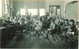 Classroom spinning and weaving demonstration, The University of Iowa elementary school, 1920s