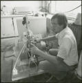 Researcher with two stage regulator, 1978.