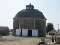 015.  Concrete corn crib and feed shed