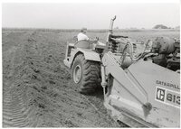 1979  Three views of man driving Caterpillar 613 earthmoving machine