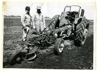 Farmers Watching Auger