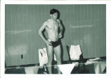 Swimmer poolside at meet, The University of Iowa, March 1967
