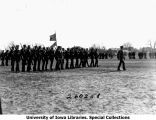 Cadets marching in formation in a field, The University of Iowa, 1929