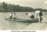 Launching a canoe, The University of Iowa, 1930s