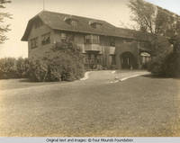 Grey house carport and front entrance