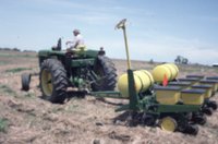 Photograph Collection Of A Man On A Tractor 