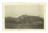 Southwest view of State Gymnasium with the Armory and Marston Water Tower in the background
