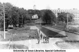 Cadets marching west on Iowa Avenue, The University of Iowa, 1920